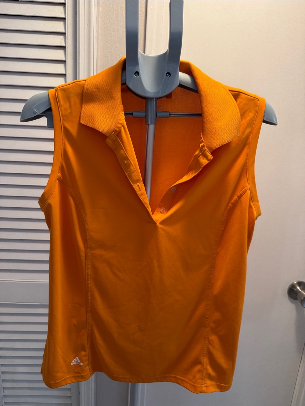 adidas Women’s Sleeveless golf Top in Orange